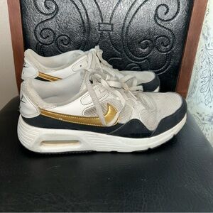 Nike Women's White, Black, and Gold Sneakers
